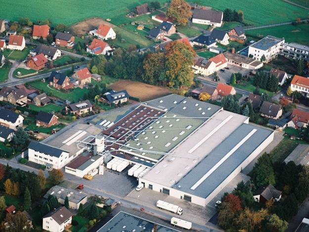 Vue aérienne du site de production en expansion dans les années 1990